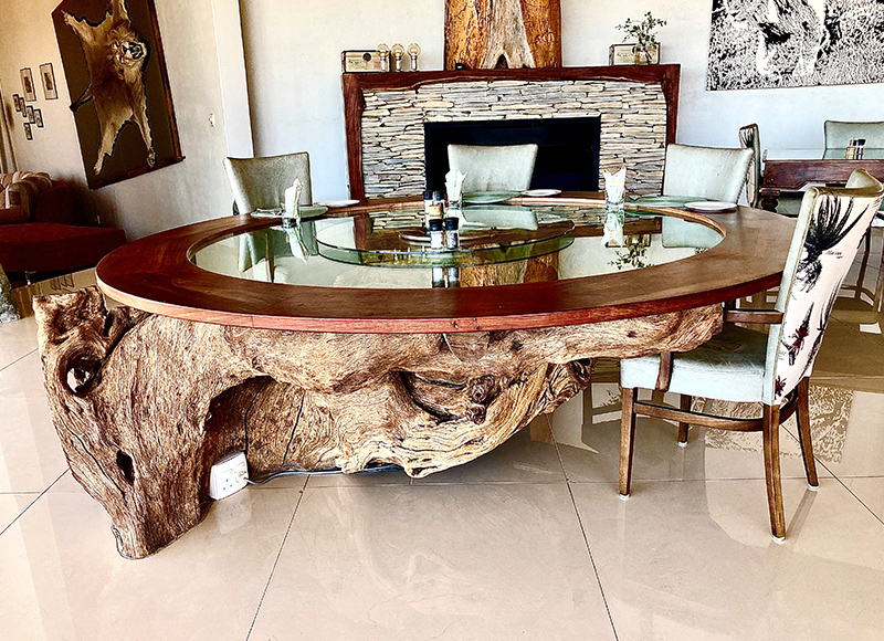 wooden table with fireplace in the backgound